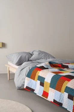 NIKA sengetæppe